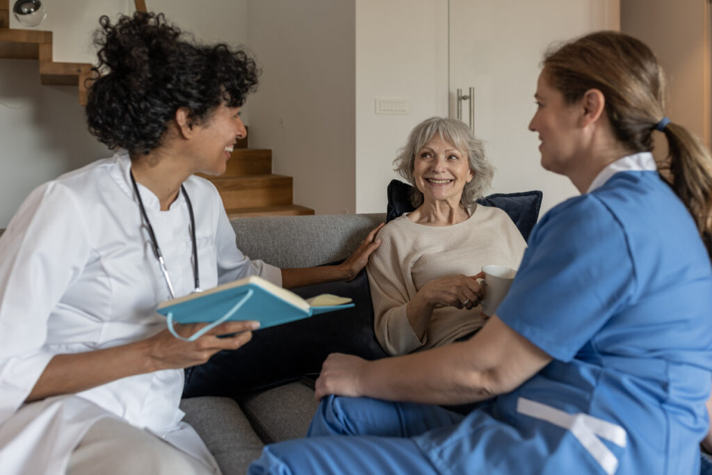 Visit of medical staff in uniform (nurse, doctor) to the patient at home Senior Care in Allentown