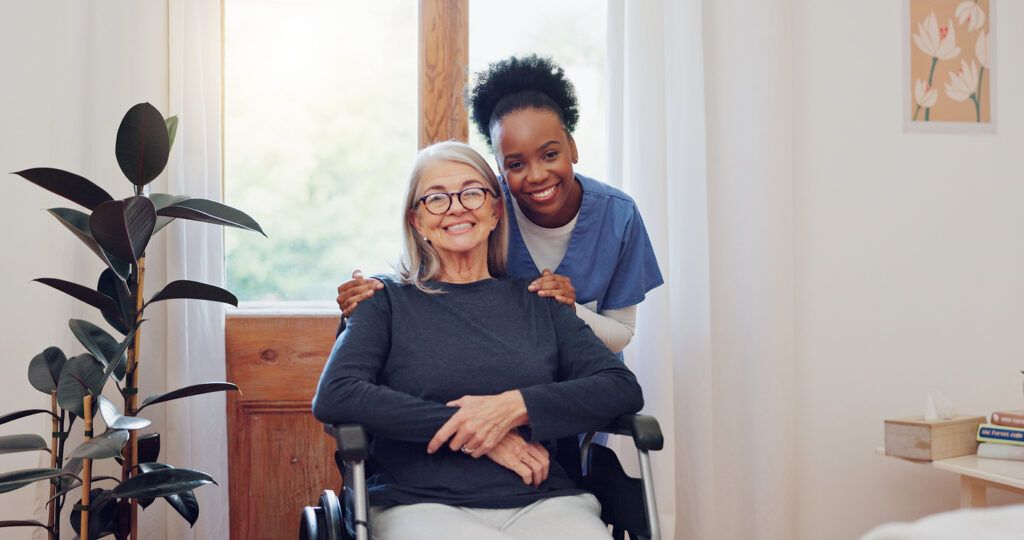 Senior care, nurse and old woman with wheelchair, portrait and smile in health at nursing home. Support, kindness and happy face of caregiver with elderly person with disability for homecare service. Finding the Best Home Care Agencies in Northeast Philadelphia