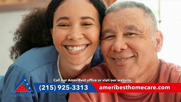 Smiling caregiver and senior man promoting compassionate home care services