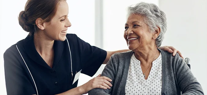 Compassionate caregiver providing emotional support and senior companionship services at home
